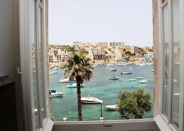 Blue Harbour 3 Bedroom Seafront Apartment With Large Yard On The Promenade - By Getawaysmalta